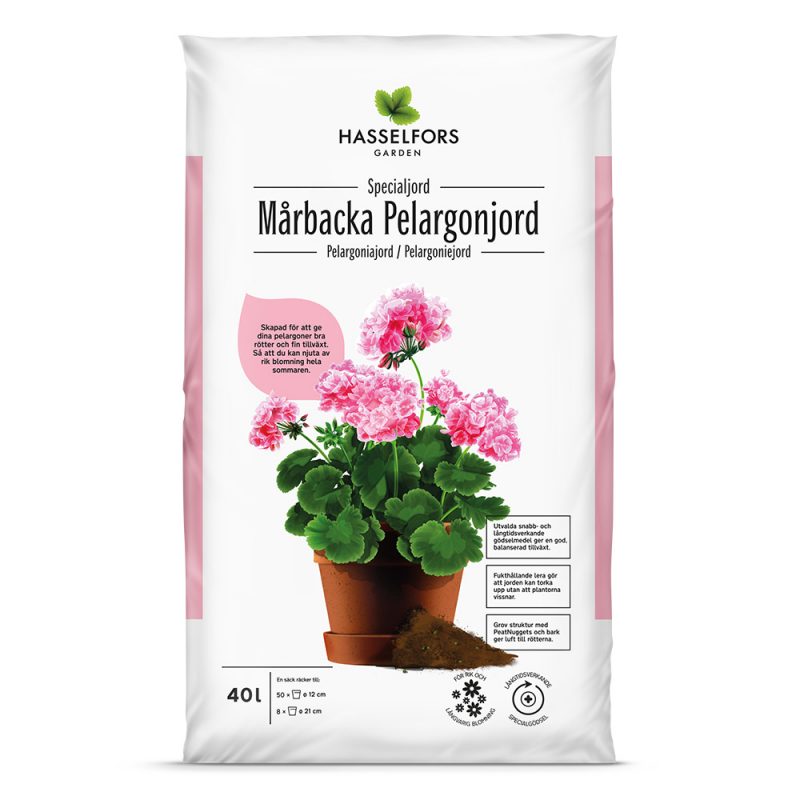 Vit påse med en kruka på med pelargonier i